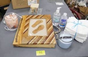 lot 31 image: Lot of candles, 8 wash cloths, rock light, scrapbook