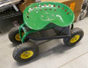 lot 48 image: Like new rolling garden seat with storage underneath