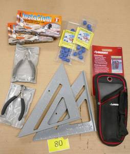 lot 80 image: Tool lot - snips, squares, caulk caps, knife pouch