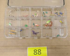 lot 88 image: lot of new ice fishing jigs in case