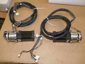 lot 117 image: Two JPC Elinco stepper motors 24vdc 3,000 rpm with encoder and pulley