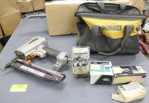 lot 126 image: Paslode 16 gauge finish nailer with nails and bag