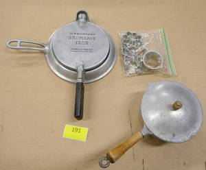 lot 191 image: Vintage Krumkake iron, rosette irons and pot