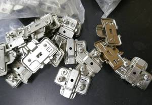 lot 289 image: Box full of misc woodworking hardware- mounting plates and hinges