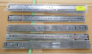lot 296 image: Seven drawer slides 20 inch long