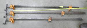 lot 311 image: Three 45-48 inch Pony pipe clamps