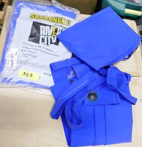 lot 323 image: 2 pair of blue rain bibs and 1 rain poncho - size Large