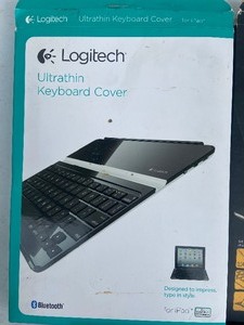 lot 13 image: Keyboards, Mouse Pad, Cover