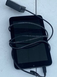 lot 16 image: WinBook Tablet, Power Strip, EZ Dock, Keyboard