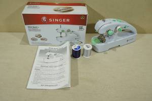 lot 71 image: Singer Stitch Quick Cordless Mending Machine