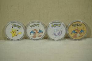 lot 90 image: Novelty Pokemon Painted Coins