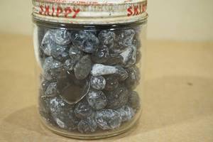 lot 261 image: Jar of Obsidian Apache Tear Stones