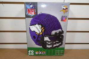 lot 334 image: 1366 Piece Puzzle - Minnesota Vikings Helmet