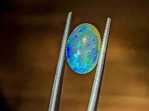 Large 3.92 Carat Natural Welo Opal Gemstone VIDEO
