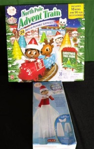 lot 291 image: NorthPole Advent Train and Magical Elf on the Shelf Standing Gear