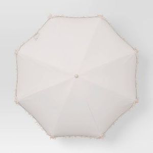 lot 250 image: 6 Umbrella with Fringe - Threshold (Red Stain on Umbrella)