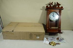 lot 36 image: Bedford Clock Collection Classic 31 Chiming Wall Clock -Cherry Oak Finish
