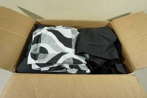 lot 151 image: Bedding -2 Black Accent Pillows, 2 BlackWhite Pillow Shams, 2 Black Window Valances, 1 Red Flat1 Red Fitted Sheet