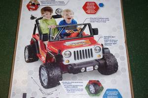 lot 158 image: Power Wheels 12V Classic Red Jeep Wrangler Ride-On