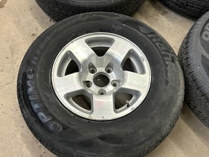 lot 7 image: Set Of (4) 5-Lug Wheels & Tires