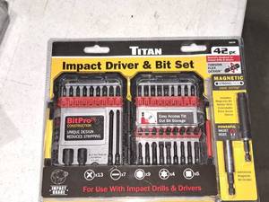 lot 857 image: Titan Impact Driver & Bit Set 42-piece (in original packaging)