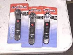 lot 887 image: Lot of (3) AccuGauge Digital Tire Pressure Gauges (in original packaging)