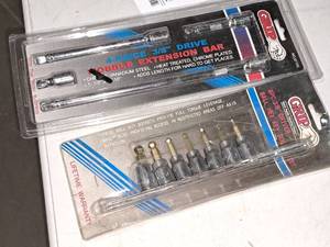 lot 945 image: Lot of (2) Hand Tools (in original packaging) - Grip 4-pc 38 Drive Wobble Extension Bar Set, Grip 8-pc 38 Drive Ball Hex Key Socket Set