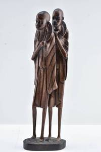 lot 57 image: Signed Tall African Hardwood Carving of Two Figures