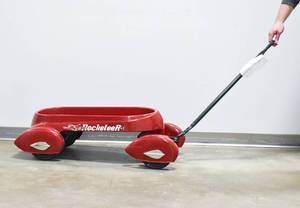lot 4 image: Red Glide Ride Rocketeer Wagon