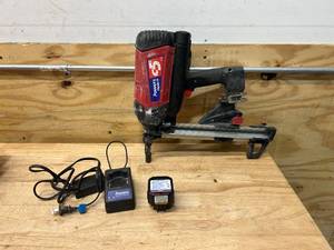 lot 94 image: POWERS TRAK-IT C5 Nail Gun with Case, 1 Battery and Charger
