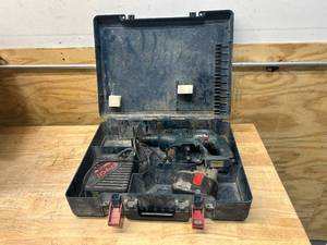 lot 74 image: BOSCH 0611 Hammer Drill with Battery, Charger and Case
