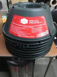lot 12 image: 8 Holiday Time Fresh Cut Tree Stand...