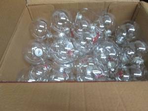 lot 13 image: Case of 100 mm Clear Craft Bulb Orn...