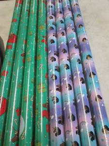 lot 38 image: 8 Rolls Christmas Wrapping Paper...