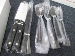 lot 118 image: Black Stainless Flatware Set for 4...