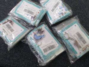 lot 222 image: 5- 8pks Acrylic KeychainsBackpack ...