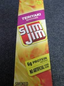 lot 293 image: Box of 24-0.97 oz Slim Jims Teriyak...