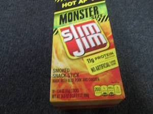 lot 295 image: Box of 18 - 1.94 oz Slim Jim Monste...