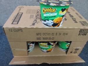 lot 310 image: 12- 2.25 oz pks Cheetos MacNCheese...