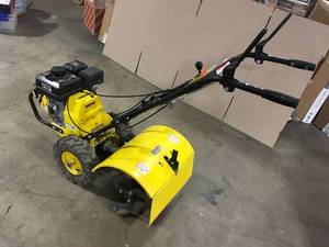 lot 23 image: Champion Power Equipment  19 in. 212cc 4-Stroke Gas Garden Counter Rotating Rear Tine Tiller with Self-Propelled Agricultural Tires, Customer return, review all pictures