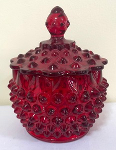 lot 116 image: Vintage Fenton Ruby Red Hobnail Vase, Fenton Ruby Red Lidded Candy Dish and Two Fenton Ruby Red Hobnail Shoe Figurines