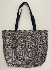 lot 128 image: Le Sportsac Leopard Print Tote, Backpack, Fanny Pack and 2 Pouches