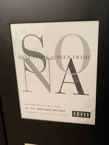 lot 300 image: Umbra Trifold Picture Frame Wall Unit