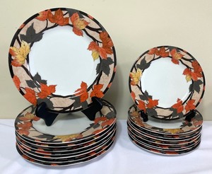 lot 231 image: Suzanne Evens Farberware Leaves by Retroneu Dishware Service for 8