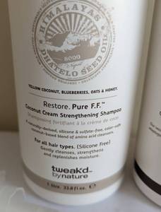 lot 214 image: New Tweaked by Nature Liter Size Restore Shampoo and Conditioner