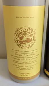 lot 215 image: New Tweaked by Nature Liter Size Coco Nutty Shampoo and Conditioner