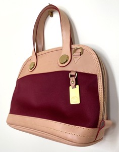 lot 390 image: Dooney & Bourke Cabriolet Handbag