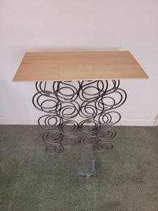 lot 62 image: Modern Contemporary Scrolled Wine Rack Table