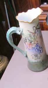 lot 88 image: Tall Grapevine Vase with vine stalk handle, Hand painted and marked JPL, French made and attributed to Limoges