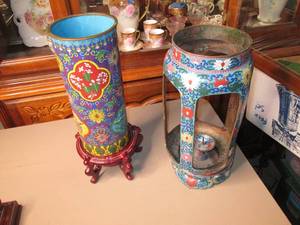 lot 90 image: Pair of (2) Chinese Cloisinne candle holders, made with enamel and copper.  Pictured to the right is a vintage candle holder and to the left is a tall vase.  The colors and design are great and they were made around 1900.